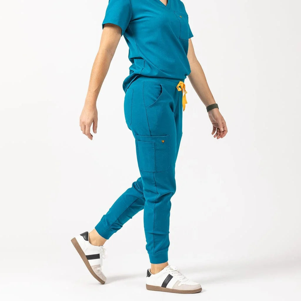 why do healthcare workers wear scrubs