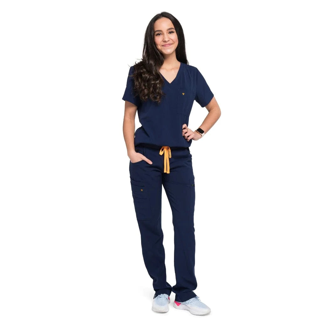 Love the design of her navy blue scrubs. Want to find something like it